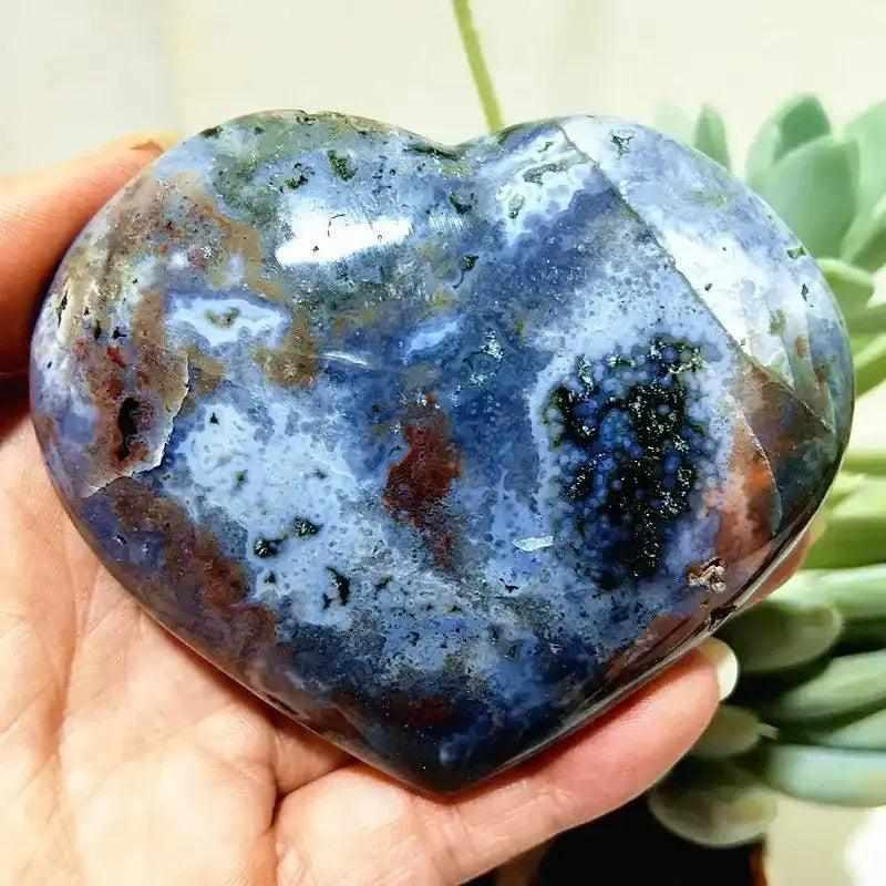Polished Ocean Jasper heart featuring calming sea green and blue orb patterns, perfect for Heart Chakra meditation.