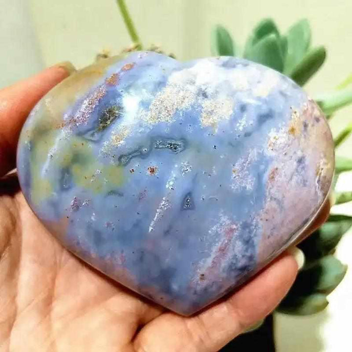 Polished Ocean Jasper heart featuring calming sea green, cream, and blush orb patterns for Heart Chakra healing and peace.