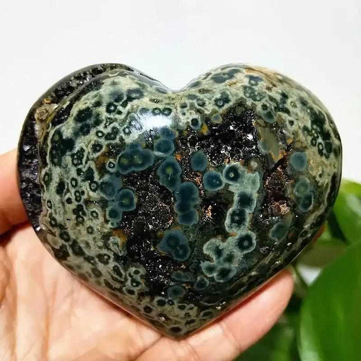 Polished Ocean Jasper heart stone featuring deep green orbicular patterns and a calming, grounding crystal energy.