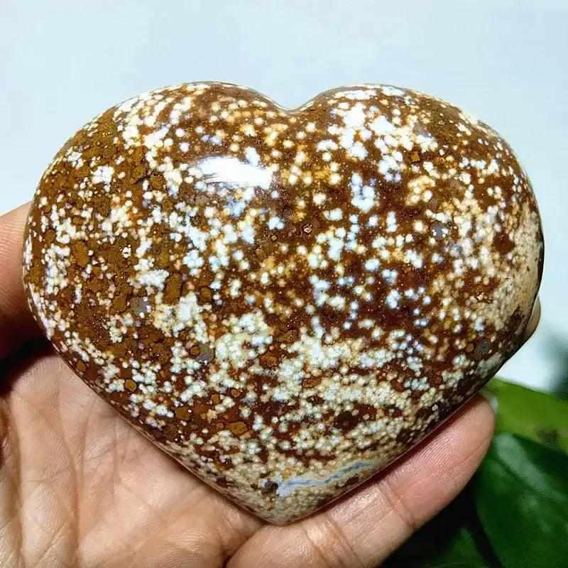 Polished Ocean Jasper Heart stone featuring brown and white orbicular patterns for Heart Chakra healing and tranquility.