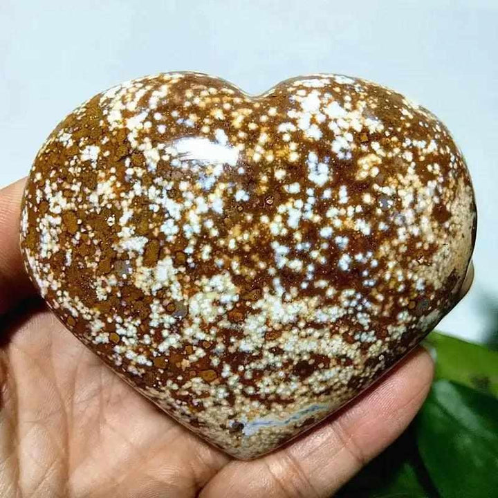 Polished Ocean Jasper Heart stone featuring brown and white orbicular patterns for Heart Chakra healing and tranquility.