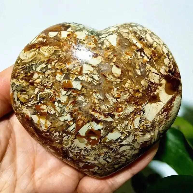 Polished Ocean Jasper heart stone with swirling brown, cream, and orbicular patterns for Heart Chakra healing and calm.