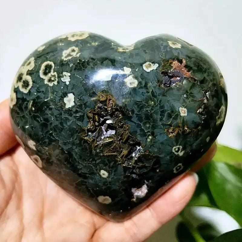 Polished Ocean Jasper heart stone featuring green, white, and pink orb patterns for Heart Chakra healing and tranquility.