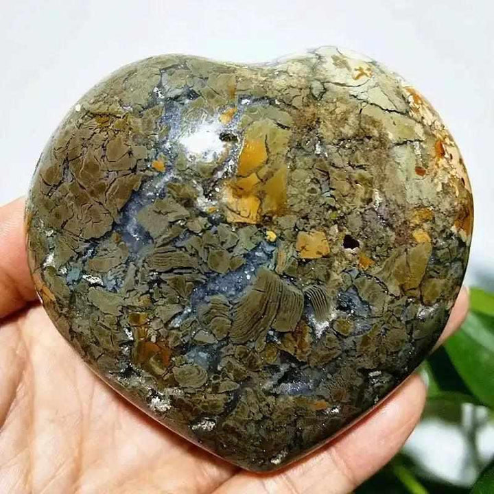 Polished Ocean Jasper heart stone featuring earthy green, brown, and cream orb patterns for Heart Chakra healing.