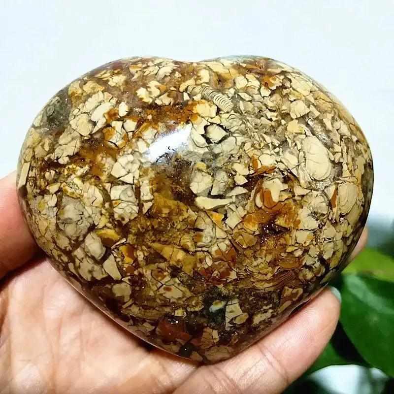 Polished Ocean Jasper heart stone with swirling brown and cream orb patterns, perfect for Heart Chakra healing.
