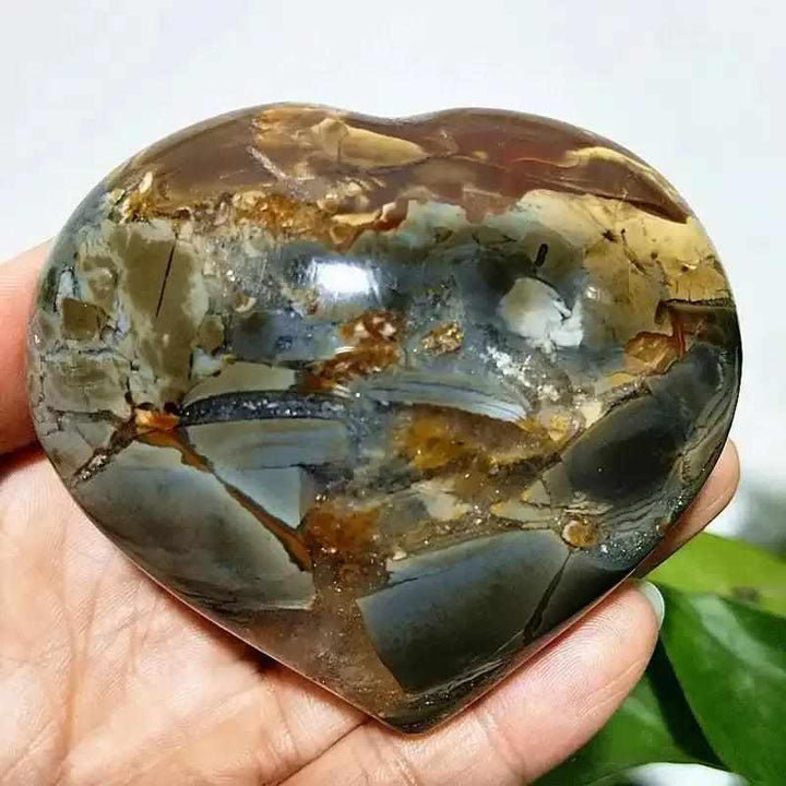 Polished Ocean Jasper heart stone with swirling green and brown orb patterns, perfect for Heart Chakra healing and calm.