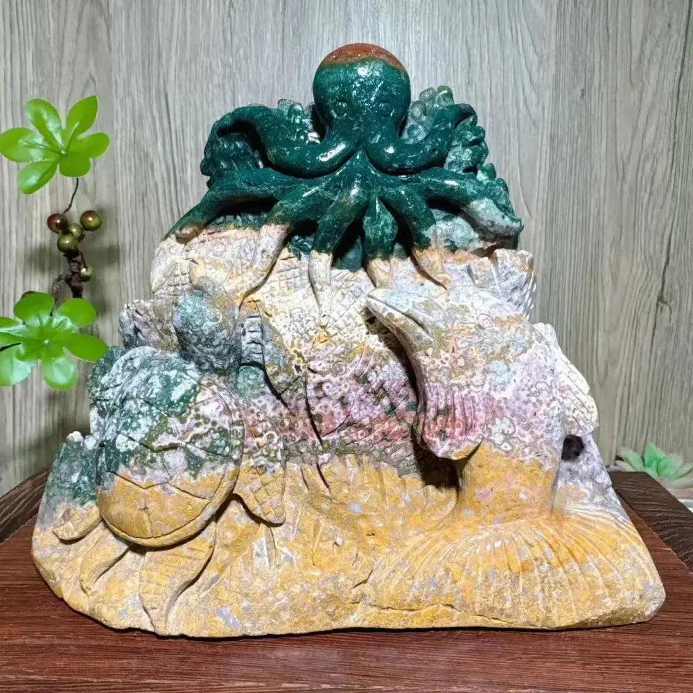 Hand-carved Ocean Jasper "Ocean World" crystal with green octopus, turtle, dolphin, and fish by Crystal Destiny.
