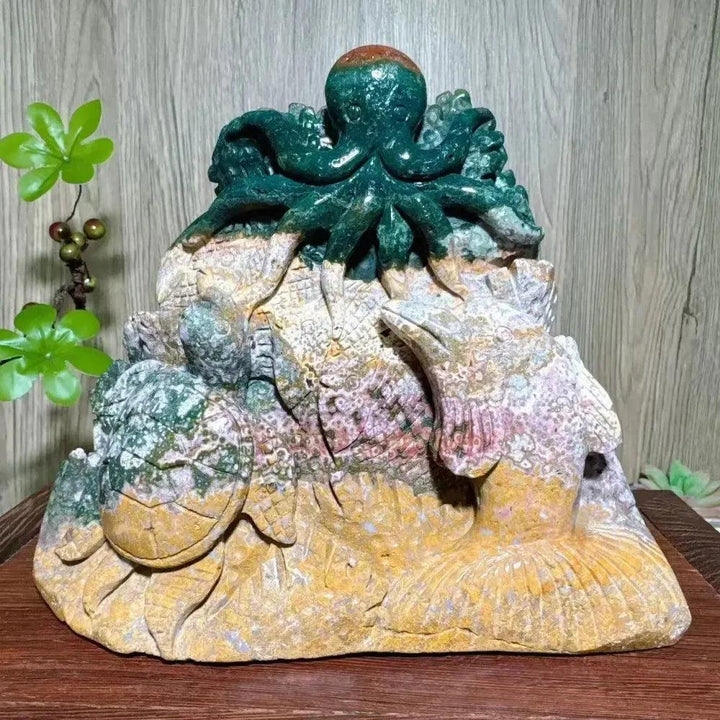 Hand-carved Ocean Jasper "Ocean World" crystal with green octopus, turtle, dolphin, and fish by Crystal Destiny.