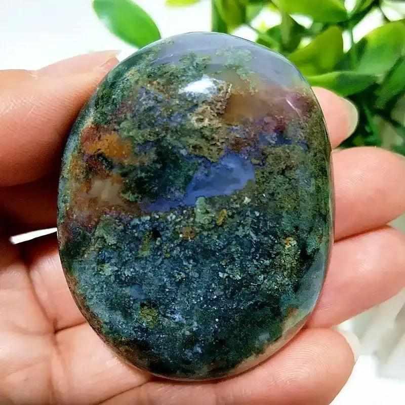 Polished Ocean Jasper palm stone with green, cream, and pink swirls for Heart Chakra healing and calming meditation.