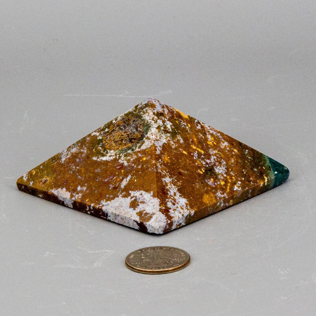 Crystal Destiny's Ocean Jasper pyramid, 3" with earthy tones, orb, and swirl patterns, next to a coin.