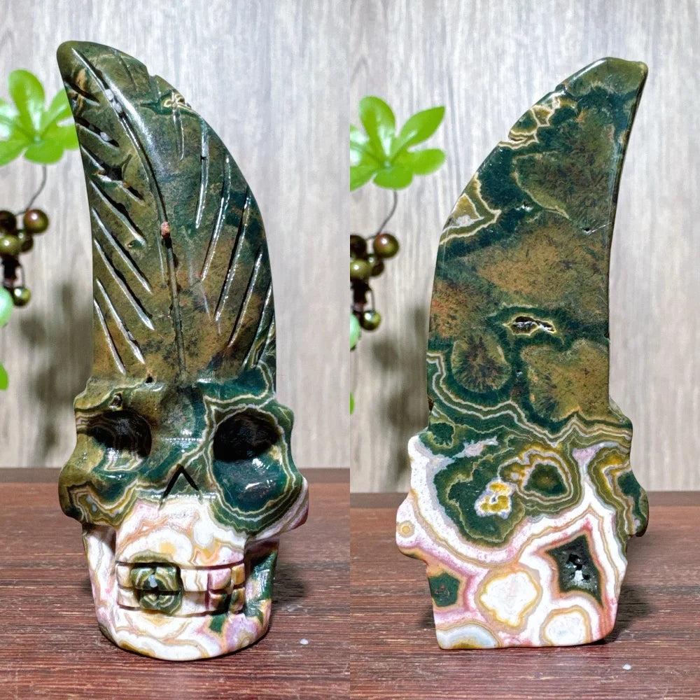 Extraordinary Ocean Jasper Skull Carving with raw druzy, featuring swirling green, brown, and white patterns.