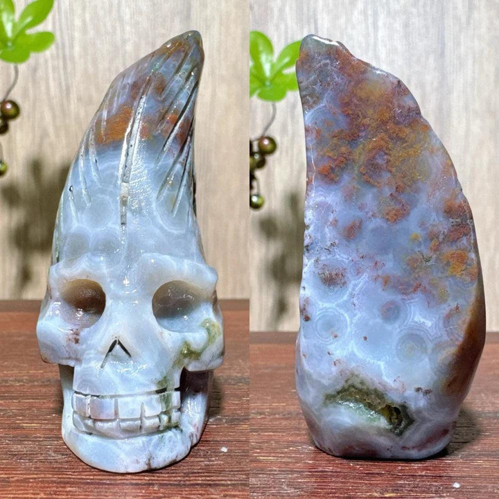 Extraordinary Ocean Jasper Skull Carving with raw druzy, showcasing swirling orbs and rings in unique colors.