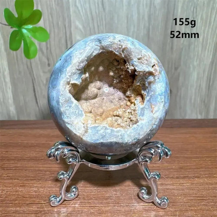 Ocean Jasper geode sphere with raw crystal interior on a silver stand, 155g, 52mm, by Crystal Destiny.