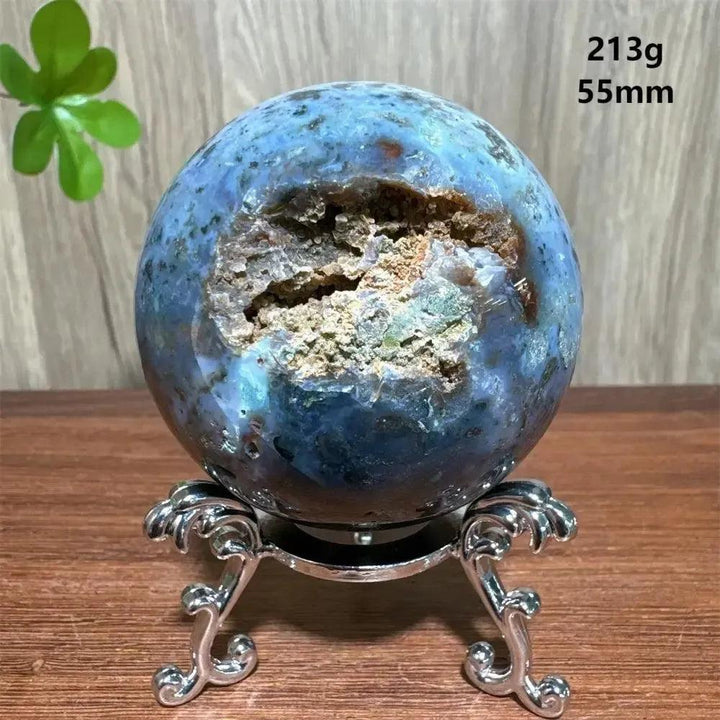 Blue Ocean Jasper sphere with natural druzy cave, 213g, 55mm, on a silver stand from Crystal Destiny.
