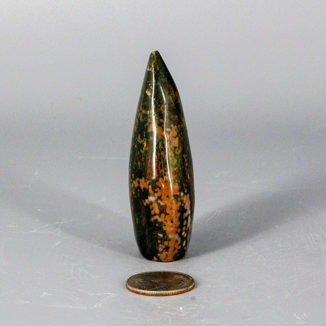 Ocean Jasper Torch Freeform from Crystal Destiny, a small, tapered crystal with green, orange, and white swirling patterns.