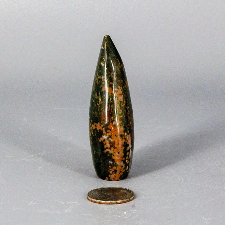 Ocean Jasper Torch Freeform from Crystal Destiny, a small, tapered crystal with green, orange, and white swirling patterns.