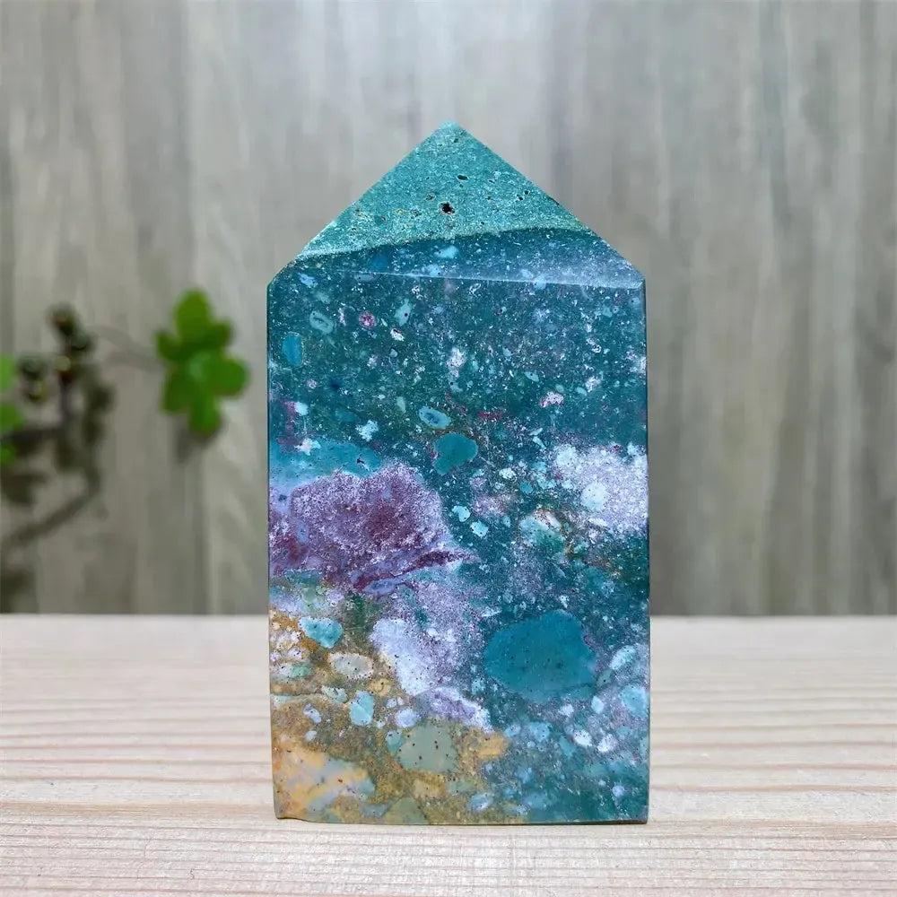 Polished Ocean Jasper tower with swirling blue, green, cream, and purple patterns, featuring sparkling druzy inclusions.