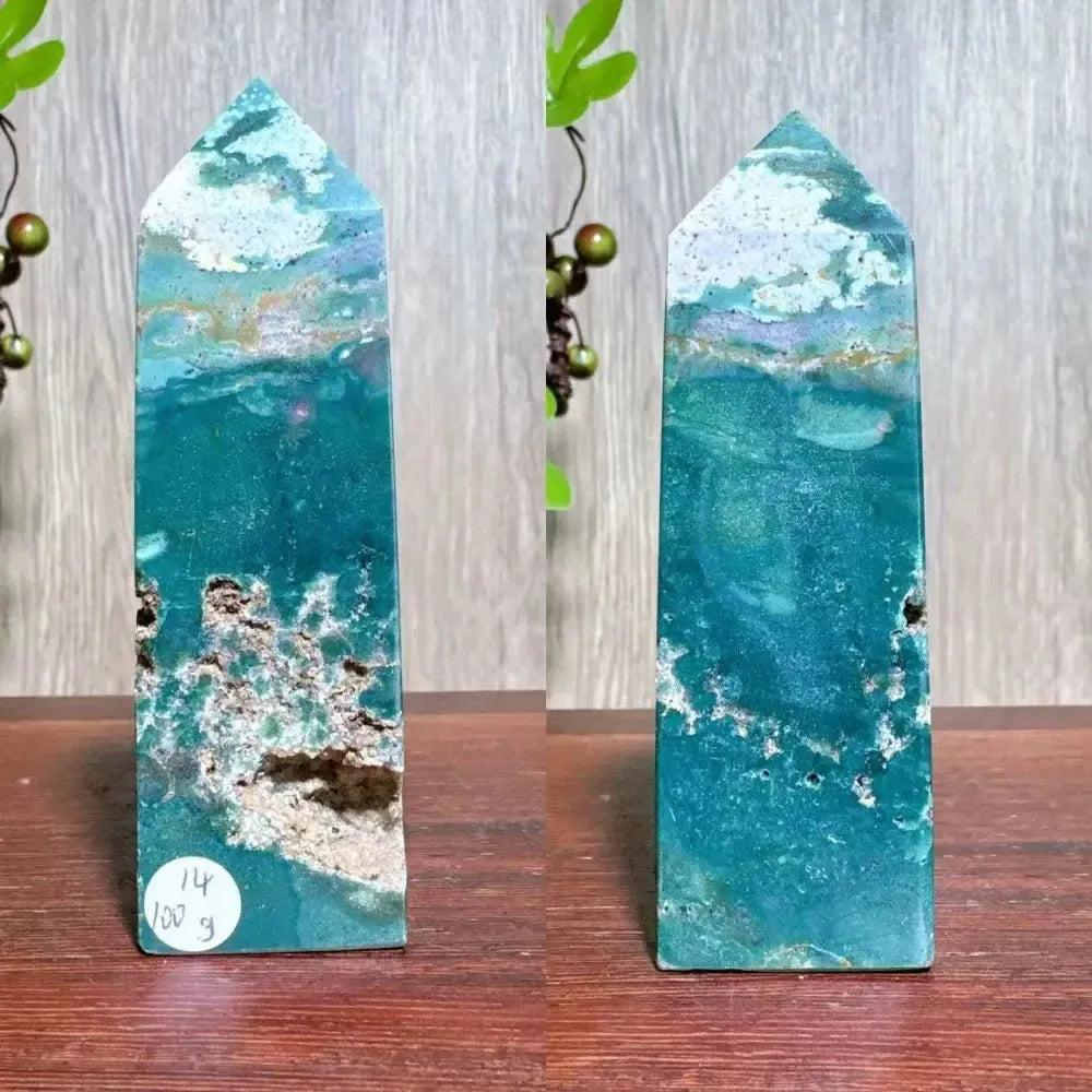 Polished blue Ocean Jasper tower with swirling patterns, moss agate druzy, and natural surface variations.