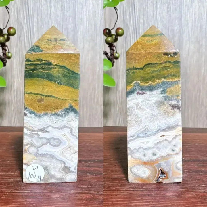 Polished Ocean Jasper tower with swirling green, yellow, white, and blue patterns, featuring natural druzy inclusions.