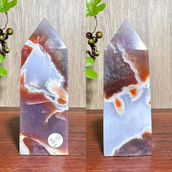 Polished Ocean Jasper tower with swirling blue, white, and reddish-brown patterns, ideal for Heart and Throat Chakra healing.