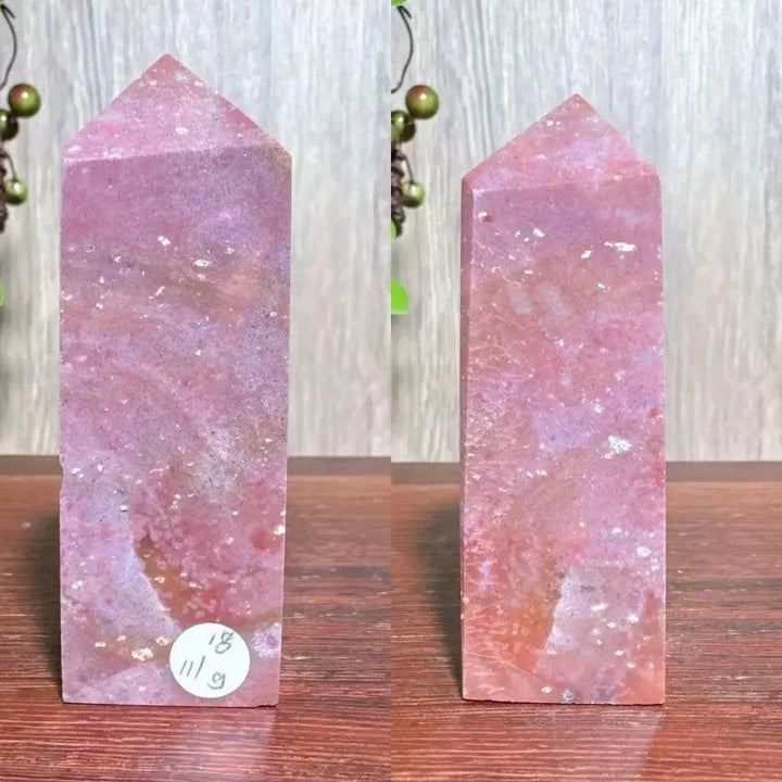 Polished pink Ocean Jasper tower with white druzy inclusions, supporting Heart and Throat Chakras.
