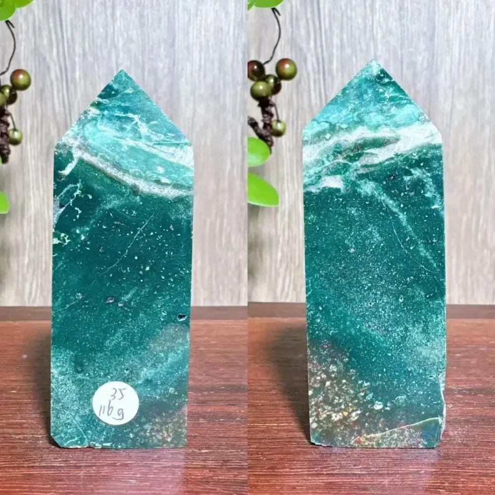 Polished blue Ocean Jasper tower with swirling green and white patterns, ideal for Heart and Throat Chakra healing.