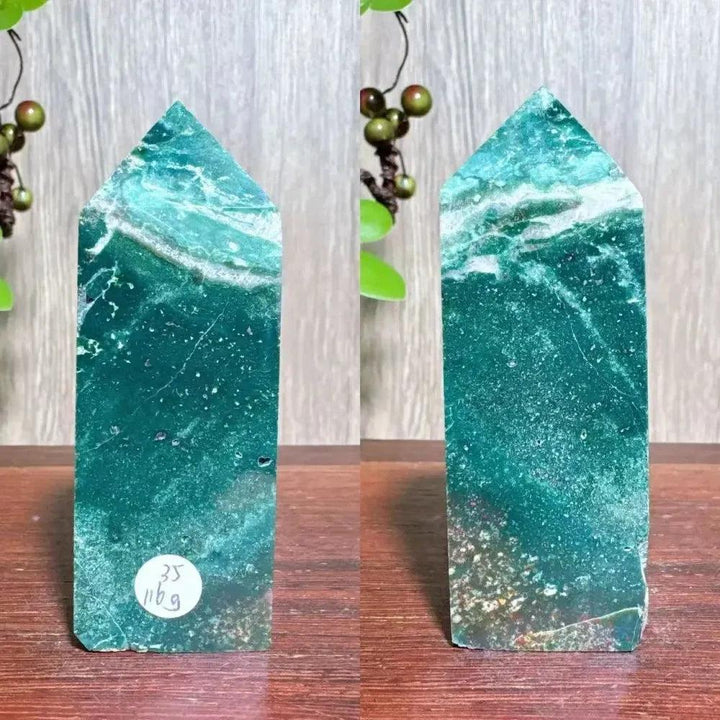 Polished blue Ocean Jasper tower with swirling green and white patterns, ideal for Heart and Throat Chakra healing.