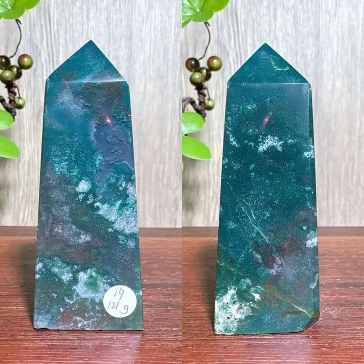 Polished blue Ocean Jasper tower with swirling patterns, moss agate druzy, and a pointed top.