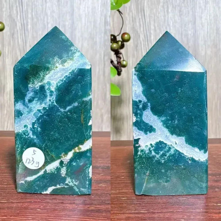 Polished green and white Moss Agate tower with natural swirling patterns, ideal for Heart and Throat Chakra healing.