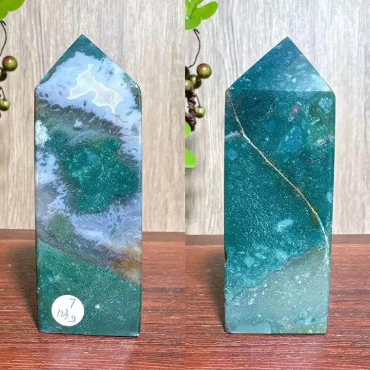 Polished blue and green Ocean Jasper tower with swirling orb patterns and natural druzy inclusions, ideal for Heart and Throat Chakras.