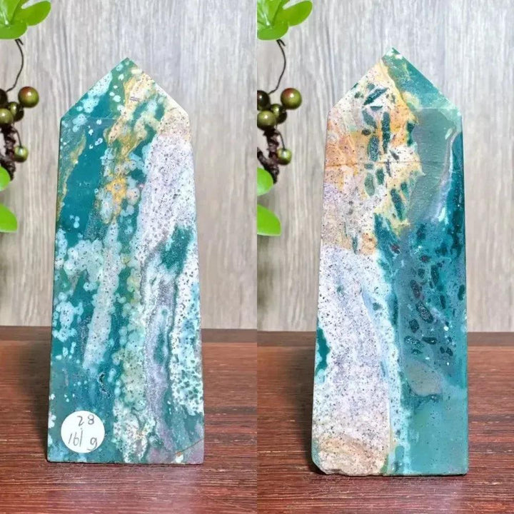 Polished blue, green, and cream Ocean Jasper tower with swirling orb patterns and sparkling druzy, ideal for Heart and Throat Chakras.