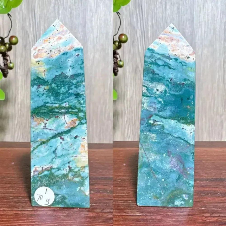 Polished blue Ocean Jasper tower with swirling green, cream, and brown patterns, featuring natural druzy inclusions.