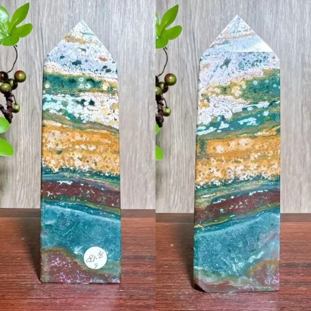 Polished Ocean Jasper tower with swirling blue, green, cream, and orange patterns, ideal for Heart and Throat Chakra.