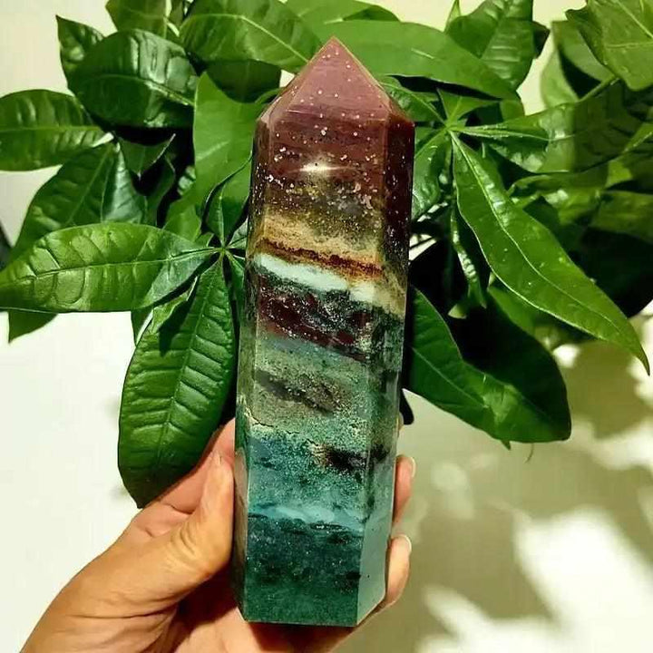 Polished Ocean Jasper tower point featuring vibrant green and red bands, perfect for Heart Chakra healing and display.