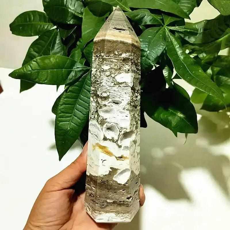 Polished Ocean Jasper tower point featuring earthy orbicular patterns, perfect for Heart Chakra meditation and decor.