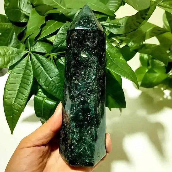 Polished dark green Ocean Jasper tower point with orbicular patterns, perfect for Heart Chakra meditation and decor.