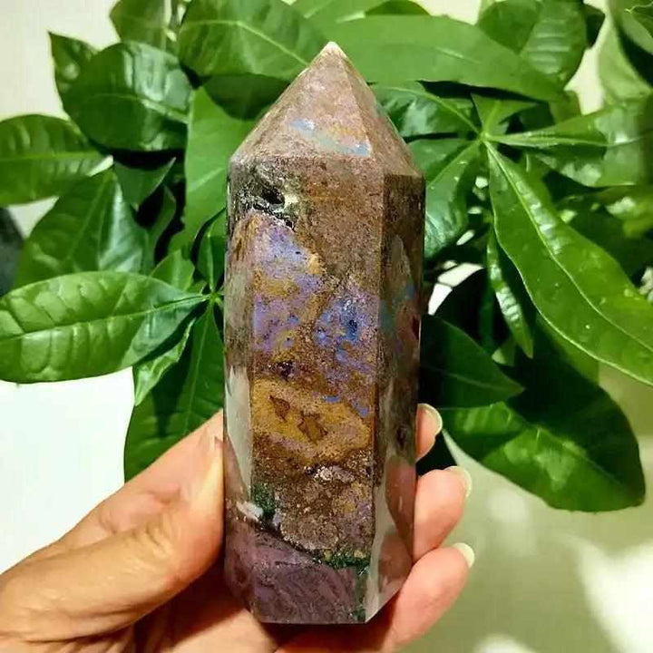 Polished Ocean Jasper tower point with vibrant purple and brown orbicular patterns for heart and throat chakra healing.