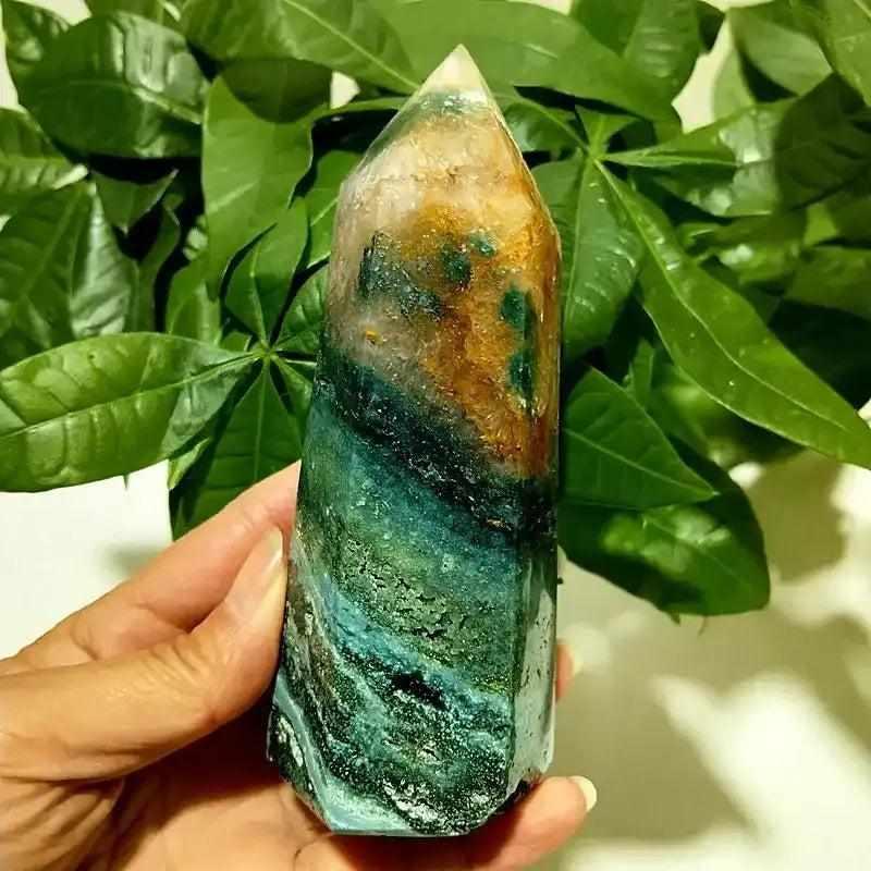 Polished Ocean Jasper tower point featuring sweeping green and gold bands for heart chakra healing and calm energy.