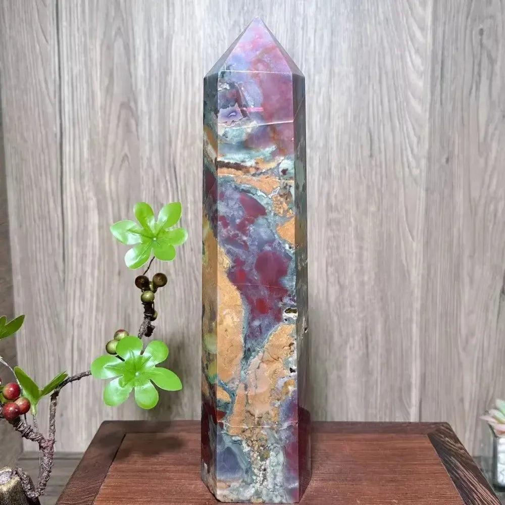 Large Ocean Jasper tower by Crystal Destiny, with vibrant red, green, yellow, and earthy orbicular patterns.