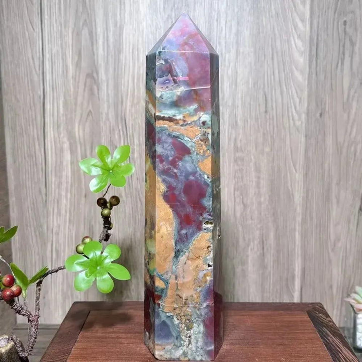 Large Ocean Jasper tower by Crystal Destiny, with vibrant red, green, yellow, and earthy orbicular patterns.