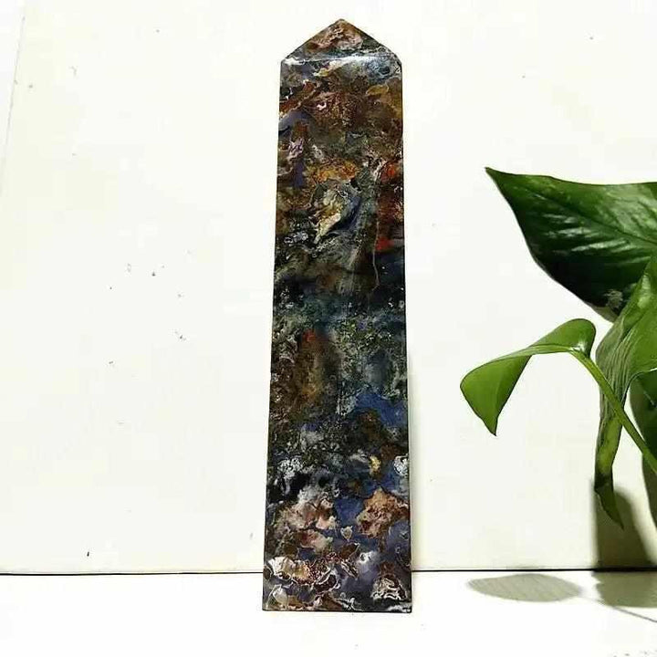 Polished Ocean Jasper tower wand featuring intricate sea green, cream, and pink orb patterns for Heart Chakra healing.