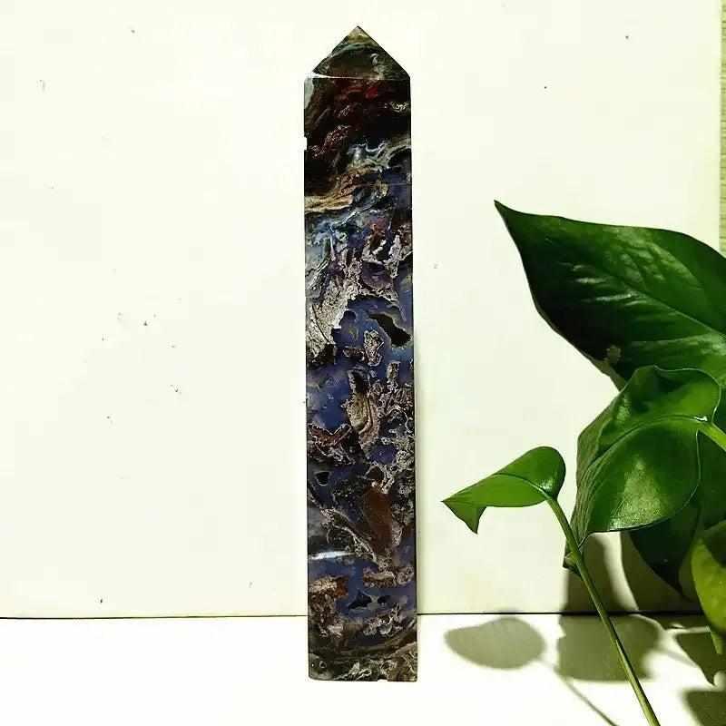 Polished Ocean Jasper tower wand featuring intricate orb patterns in deep sea green, cream, and pink for heart healing.