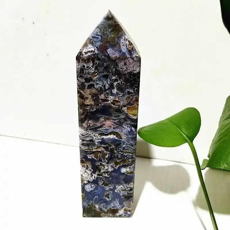Polished Ocean Jasper tower wand featuring intricate blue, cream, and pink orb patterns for heart chakra healing.