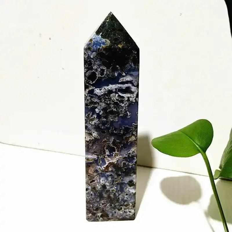 Polished Ocean Jasper tower wand featuring intricate blue and cream orb patterns for Heart and Throat Chakra healing.
