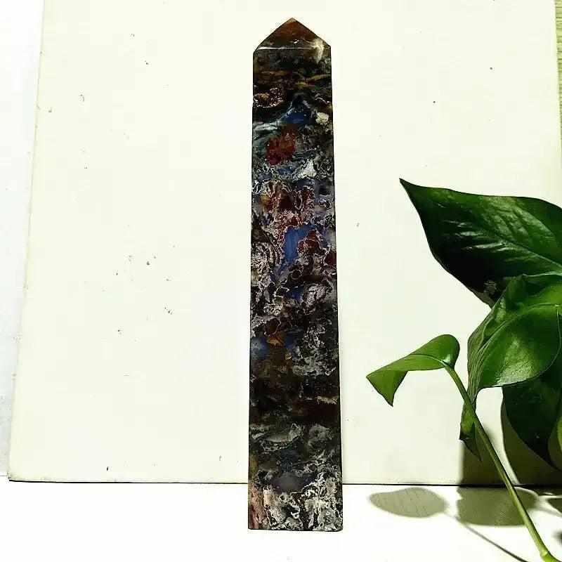 Polished Ocean Jasper tower wand featuring intricate sea green, cream, and pink orb patterns for heart chakra healing.