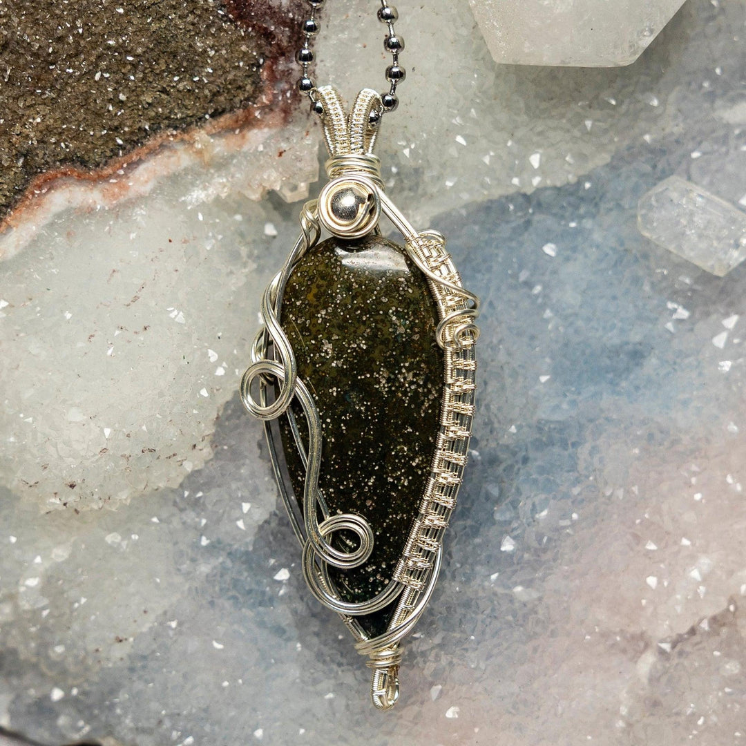 Crystal Destiny Ocean Jasper wire-wrapped pendant, 3-inch, with dark green stone and intricate silver wire.