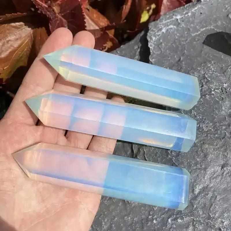 Polished opalite obelisk tower with a milky glow and blue shimmer, perfect for Third Eye Chakra meditation and altars.