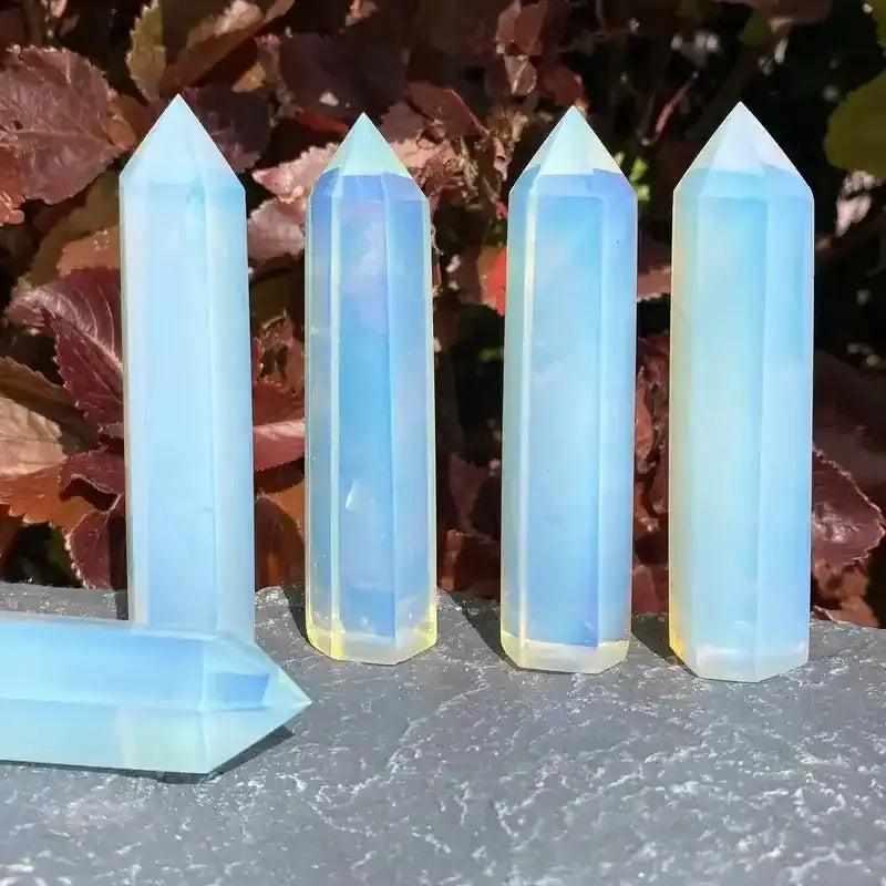 Polished opalite obelisk tower with a milky glow and blue shimmer, perfect for Third Eye Chakra meditation and altars.