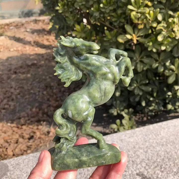 Hand-carved Ophiolite crystal horse sculpture with deep green mottled tones and a polished, grounding finish.