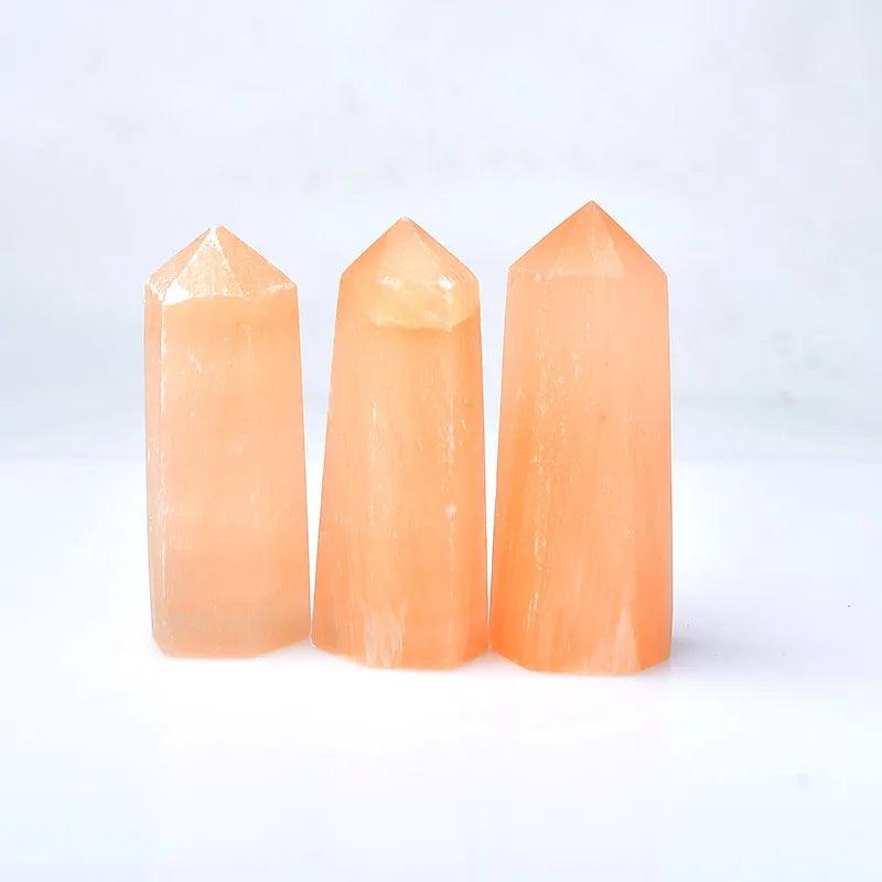 Three 60-70mm natural orange selenite crystal points, hexagonal wands for healing and decor.